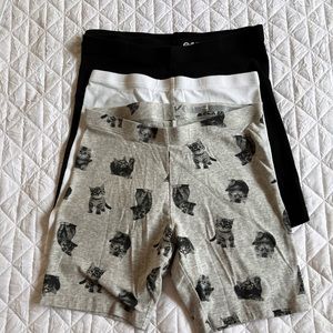 COPY - Girls bike shorts.Size 10. 4 pack. 2 black,1 white and 1 gray with design